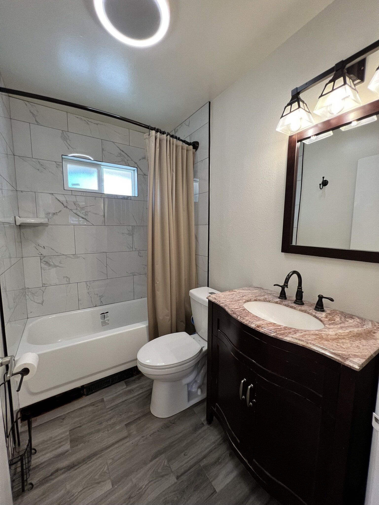 Bathroom with all new plumbing fixtures and tile - 2501 Linda Vista Avenue