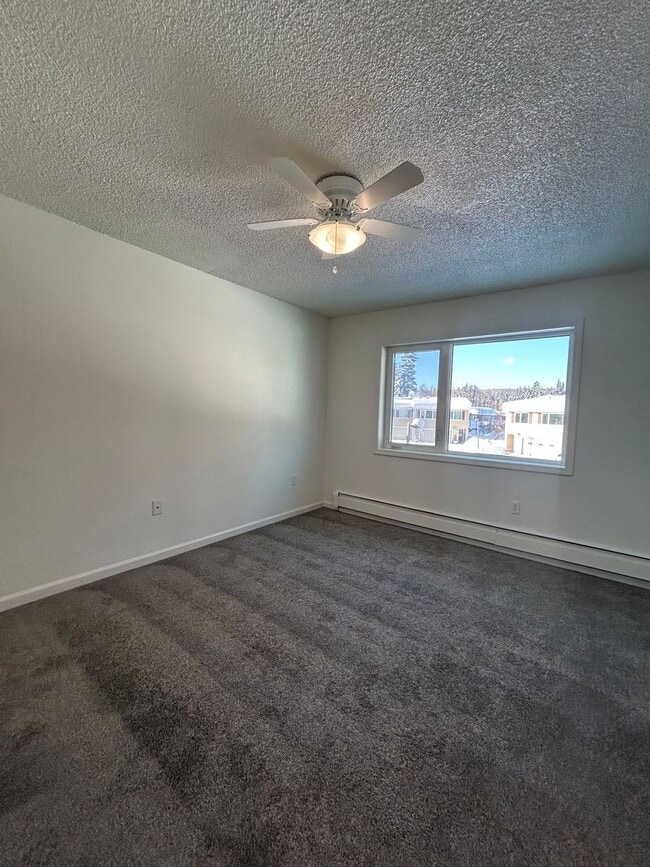 Building Photo - Century 21 Gold Rush - 3 Bed | 2 Bath | 2-Car Garage | End-Unit Condo (FAIRBANKS)