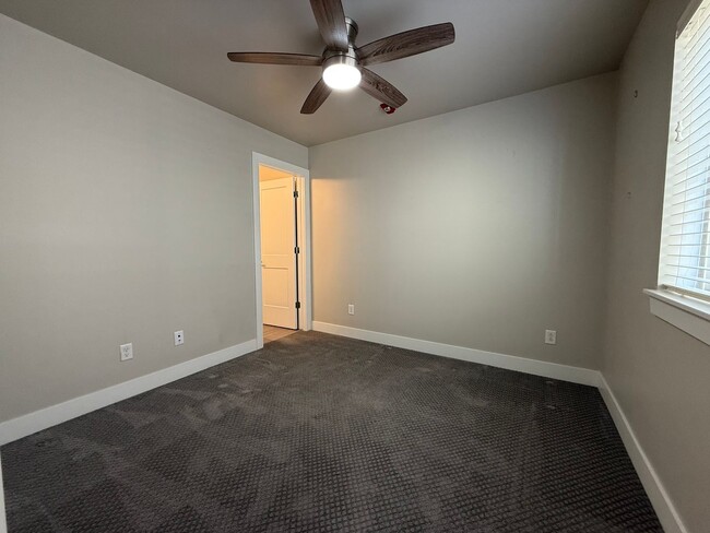 Building Photo - Modern Townhouse with Rooftop Deck & Mountain Views Near Sloan’s Lake!!