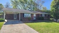 Building Photo - New and Clean with Fenced backyard in quie...