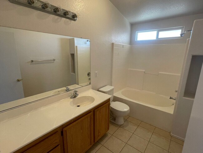 Building Photo - Adelanto Home-3 Bedrooms,2 Bathrooms, Laminate Floors, Indoor Laundry Room, Large Back Yard