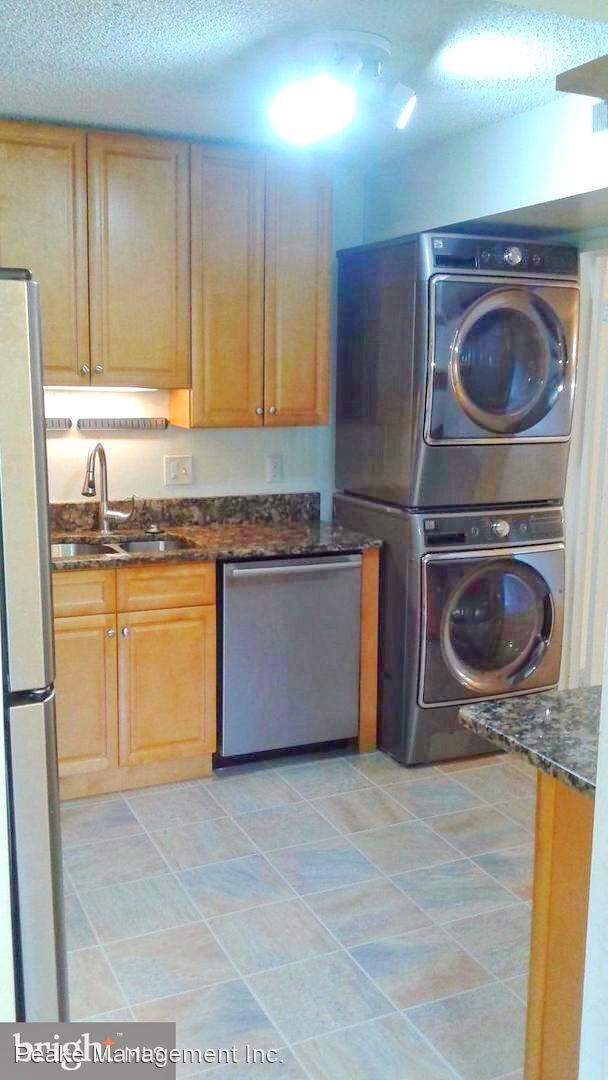 Building Photo - 2 br, 1.5 bath House - 11806 Breton Ct. #12C