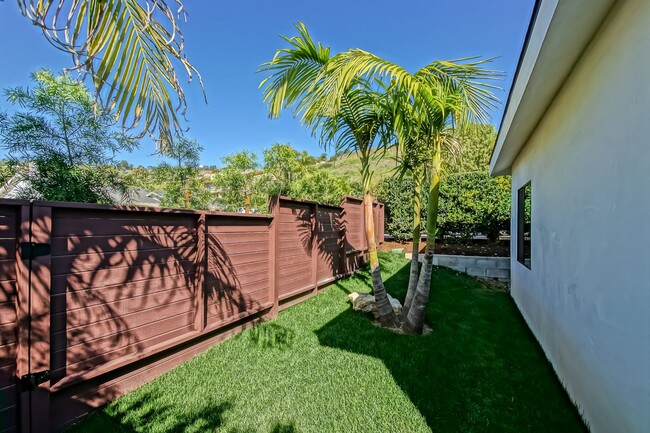 Building Photo - Beautifully Remodeled, Bright & Modern 4BR3BA Home w/ 2BR1BA Guest House On Sprawling Corner Lot ...