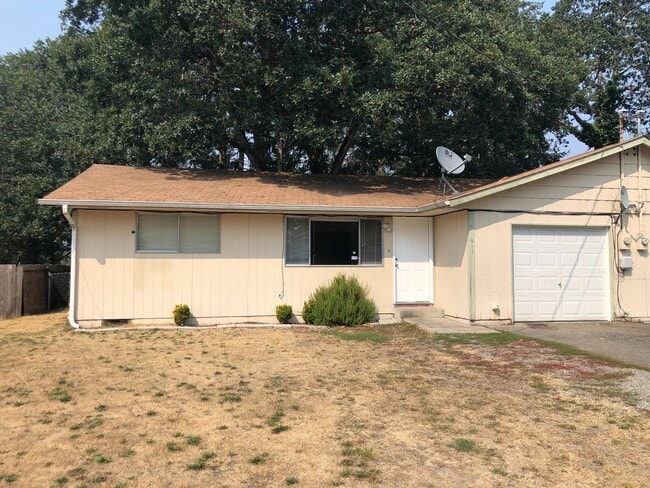 Building Photo - Clean & Move-In Ready 2-Bedroom Home with Garage and Large Fenced Yard