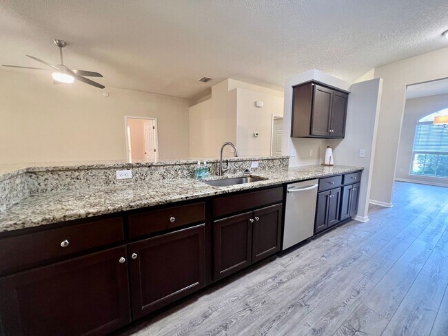 Building Photo - Behind the Gates: A Corner-Lot 4 bedroom, 2 bath Retreat in Coveted Pace Island!!