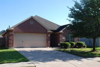 Building Photo - 1006 N Magnolia Dale Dr