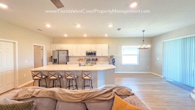 Building Photo - BRILLIANT 4 BEDROOM/2.5 BATH HOME AVAILABLE IN AVIARY at RUTLAND RANCH PARRISH!