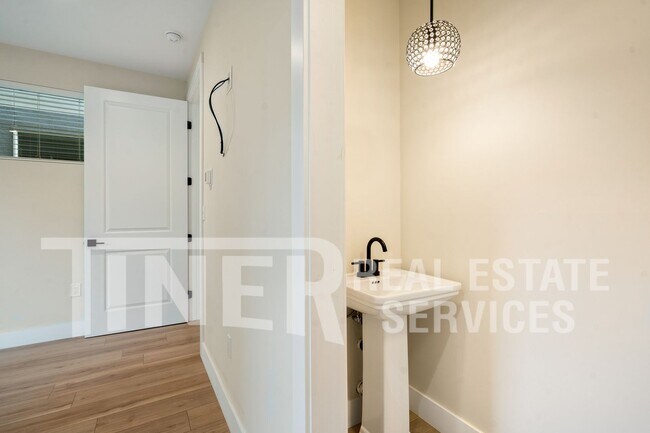 Building Photo - Elegant Modern Living