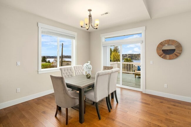 Building Photo - Water Views| Expansive Deck | Flexible Living Spaces