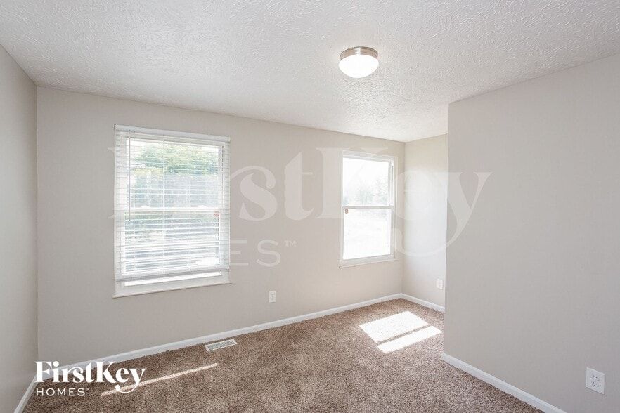 Building Photo - 8053 Harvest Ln