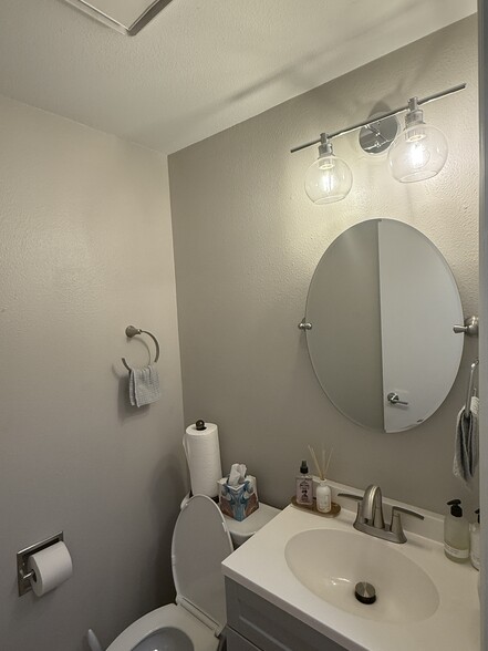 1st floor: half bath - 728 N 94th St