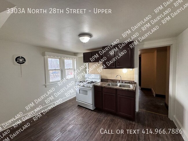 Building Photo - Charming 2-Bedroom, 1-Bathroom Upper Unit ...