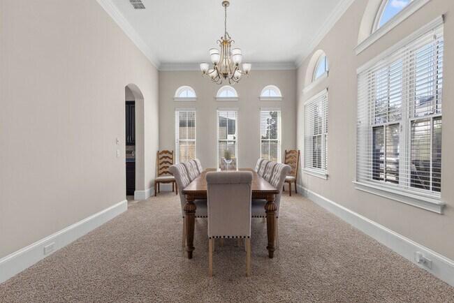 Building Photo - Luxury Waterfront Pool Home in Laureate Park | 4BR + Water Views