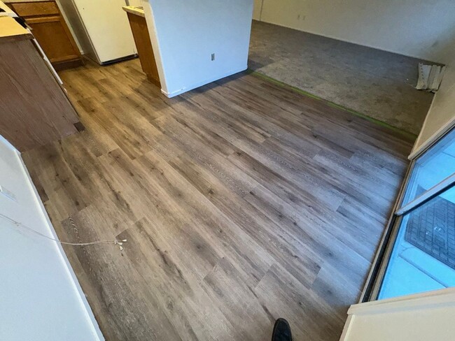 Building Photo - Fresh Paint/New Flooring all inside! Four ...