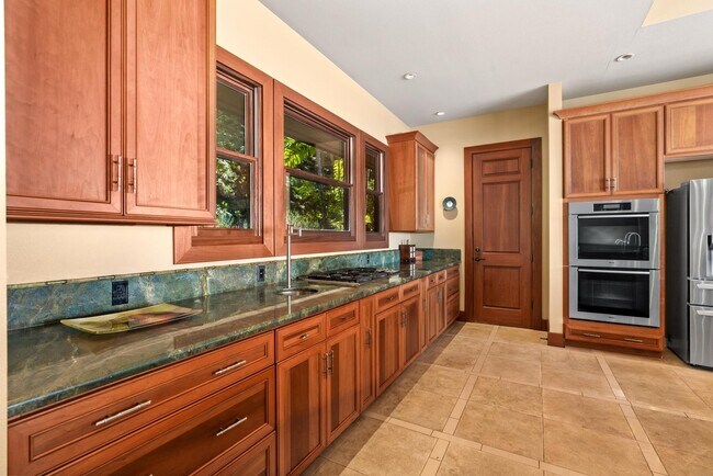 Building Photo - Luxury furnished 4 bedroom 3 bathroom with pool, spa, and outdoor showers