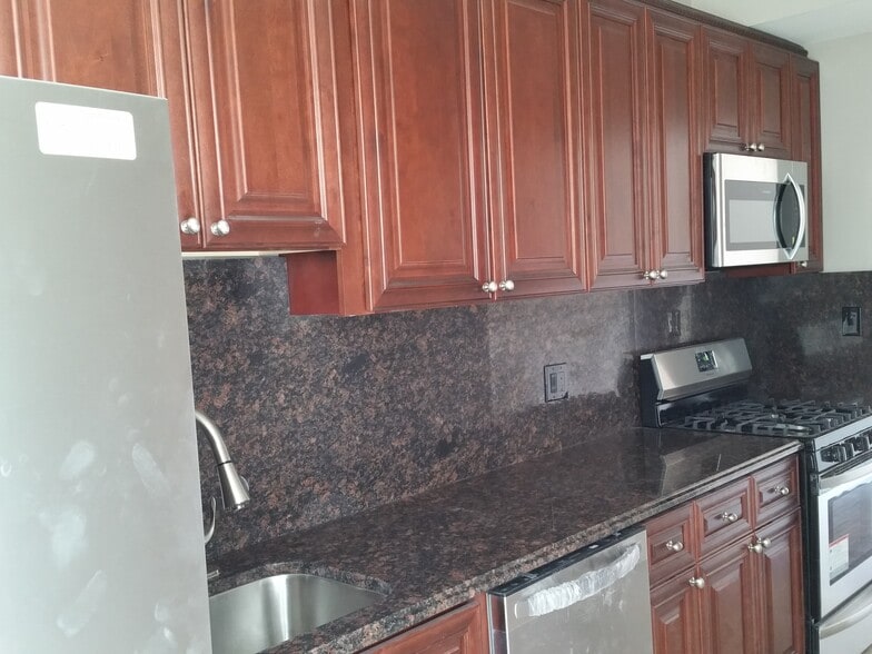 Building Photo - 1303 W Pratt Blvd