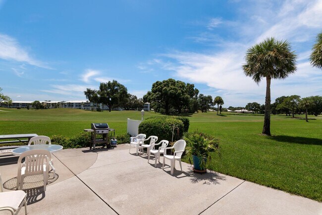 Building Photo - GORGEOUS 2 BEDROOM, 2 BATHROOM 1ST FLOOR CONDO LOCATED IN THE HIGHLY SOUGHT AFTER TENTH FAIRWAY A...