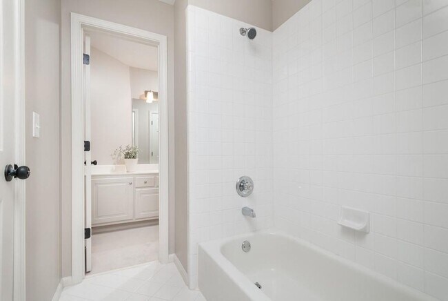 Building Photo - Elegant Master-on-Main in Prestigious Laur...
