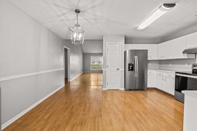 Building Photo - Charming All-Brick Home with Garage & Cove...