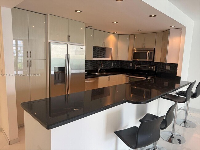 Building Photo - 19380 Collins Ave