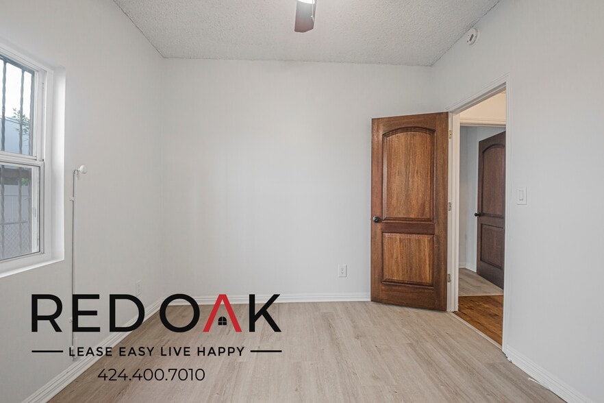 Building Photo - 1309 W 36th Pl