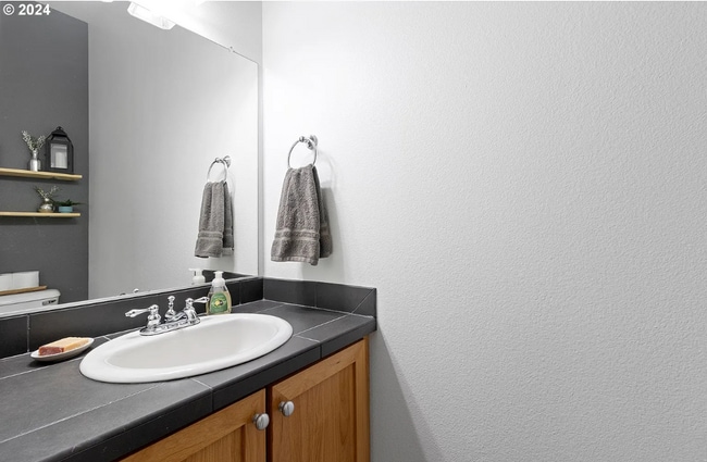 Building Photo - Welcome to this charming 2-bedroom, 2.5-bathroom home located in the desirable area of Sherwood W...