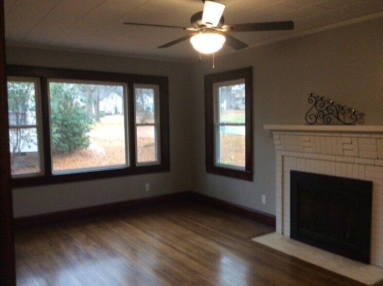 Refinished hardwoods and rich moldings throughout home - 361 W Wilson Ave