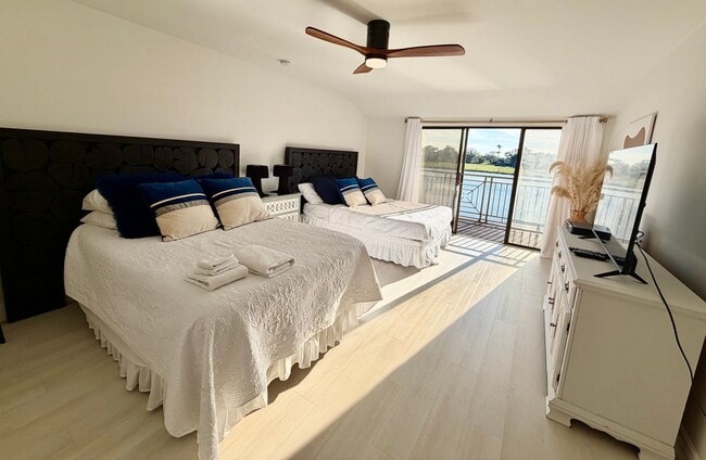 Building Photo - Bright & Modern 2-Bed Condo Overlooking Pond and Golf Course in Saddlebrook!