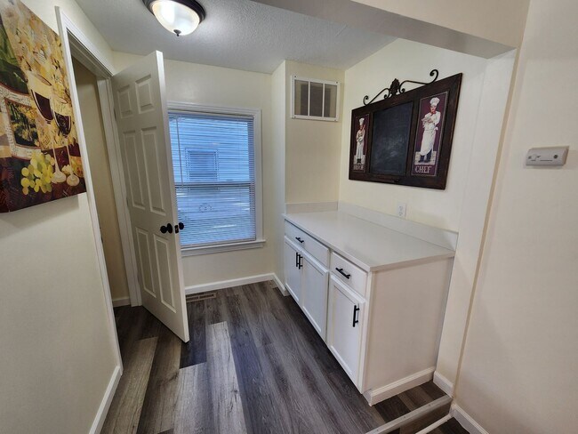 Building Photo - Beautiful remodeled 3BR, 1.5 Bth with garage and fenced backyard with newer stainless appliances