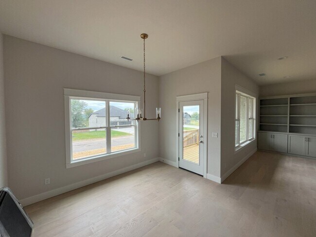 Building Photo - Nearly-new 4-bedroom, 2-bath home in the exclusive Lion's Gate Neighborhood!!!