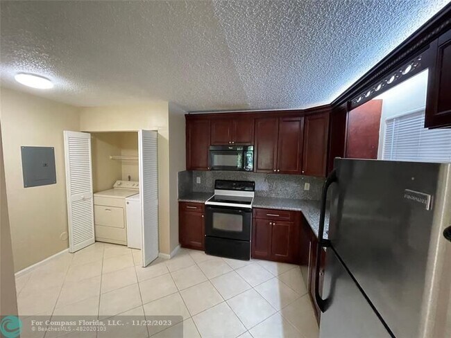 Building Photo - 12222 Royal Palm Blvd