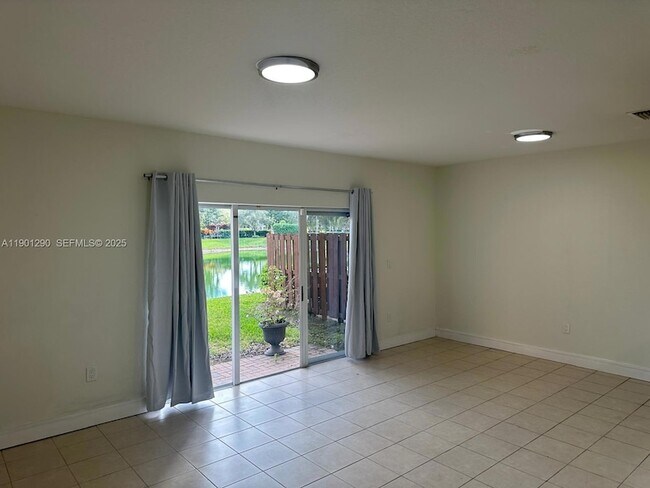 Building Photo - 3390 NE 13th Cir Dr