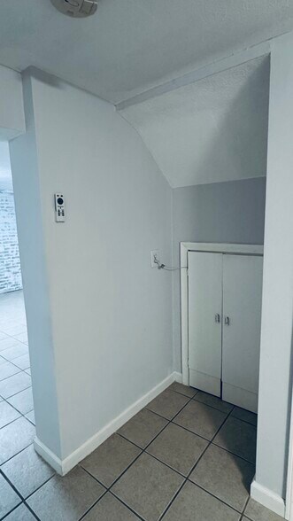 Small storage area under stairs - 36 Summer St