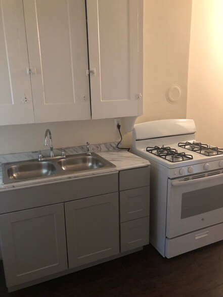 Kitchen includes gas stove and refrigerator - 10000 Lamont Ave