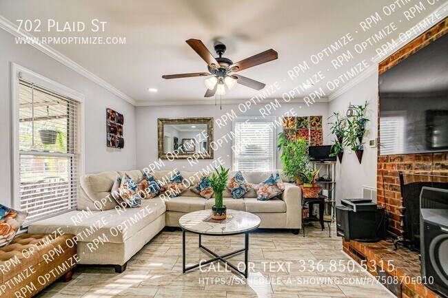 Building Photo - 702 Plaid St