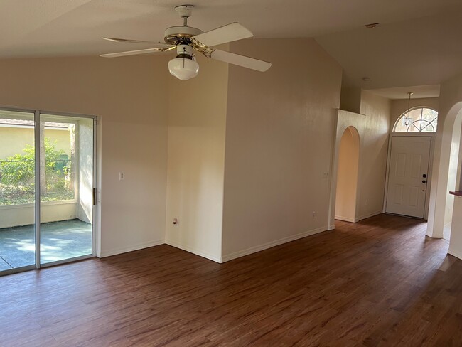 living room with lanai - 2488 Tremont Dr