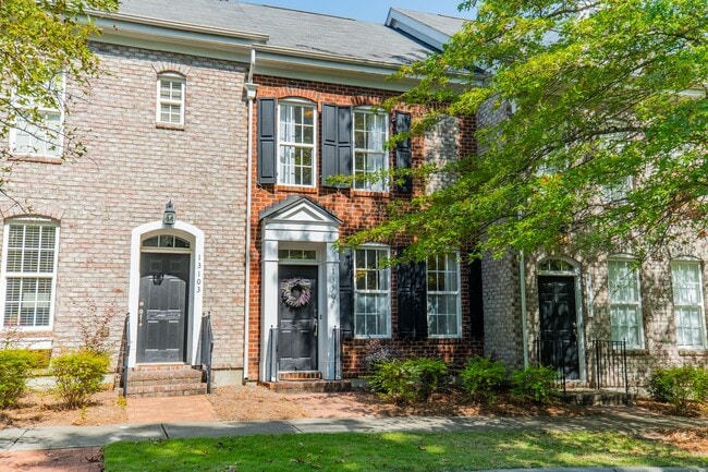 Building Photo - UPGRADES! Two Bedroom Townhouse - Six Mont...