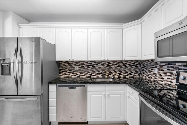 Building Photo - 9273 Collins Ave