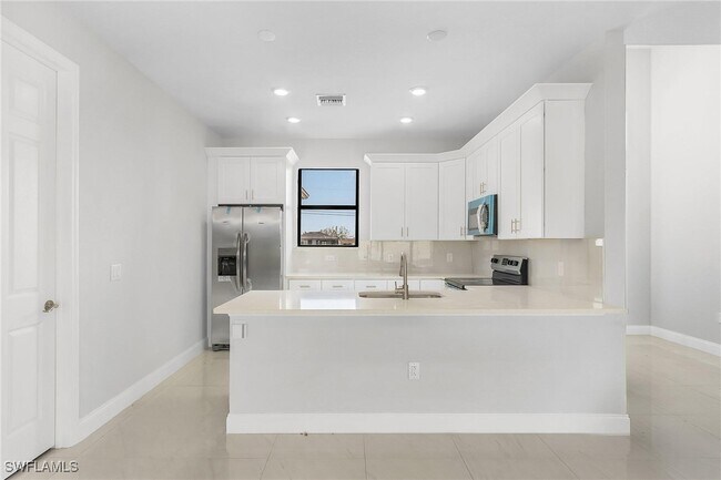 Building Photo - 2435 Tropicana Parkway W