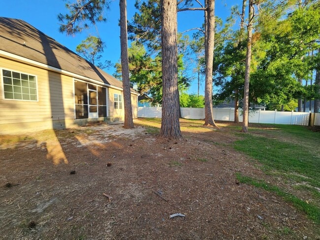 Building Photo - !!$500!! OFF FIRST MONTH!! Spacious 4BR Home with Fireplace, Screened Porch & Privacy-Fenced Yard