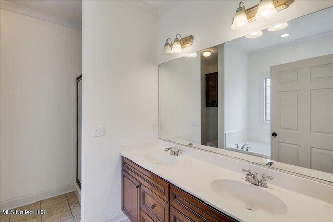 Building Photo - 409 Sand Stone Pl