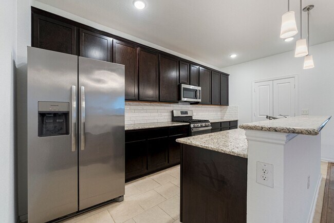 Building Photo - Stunning 4/2 Brand New Home in Kyle!