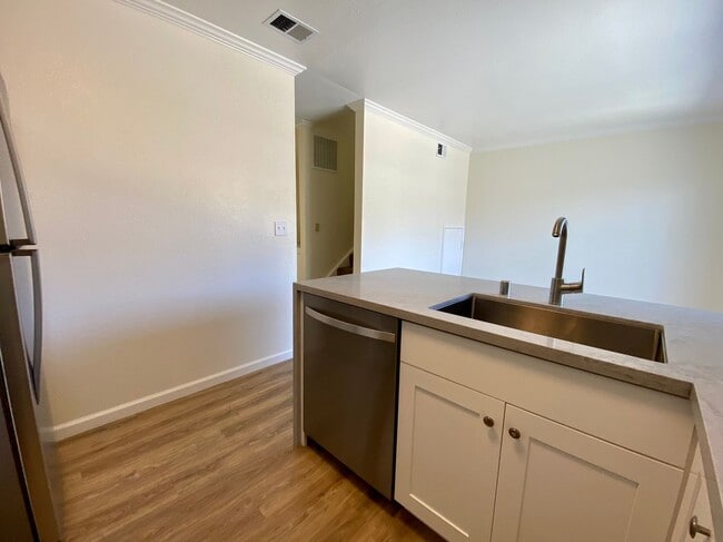 Building Photo - Newly Renovated Condo with NEW KITCHEN! - ...