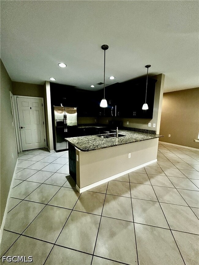 Building Photo - 12117 Palm Cove St