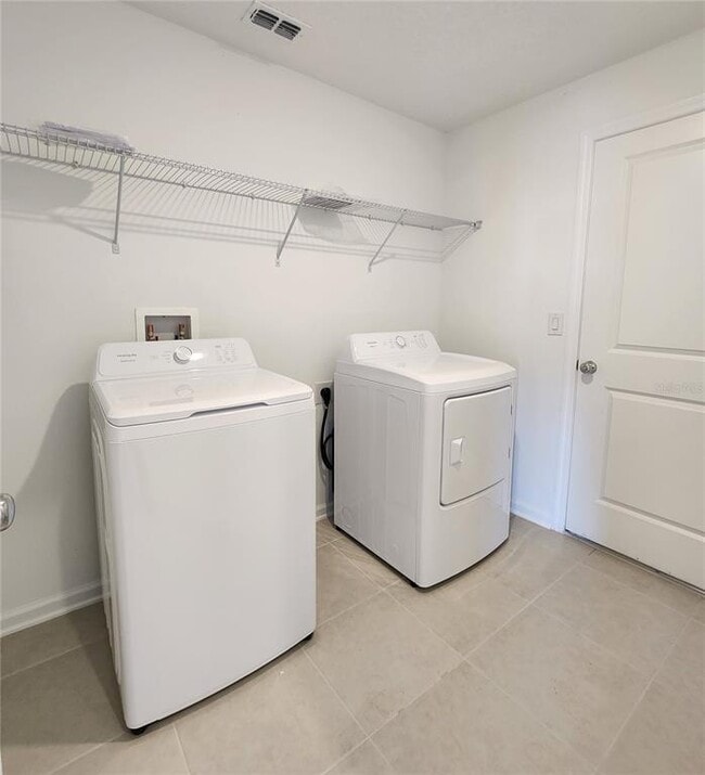 Building Photo - 5130 Magnolia Palm Dr