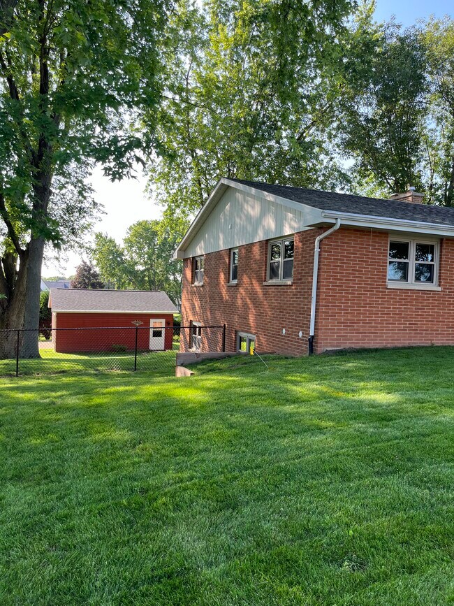 Large fenced-in back yard with lower-level walk-out - 2790 S Ridge Rd