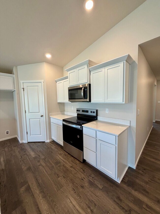 Building Photo - Beautiful & Brand New- 4 bed, 2 bath w/Quartz Countertops & Fenced Yard
