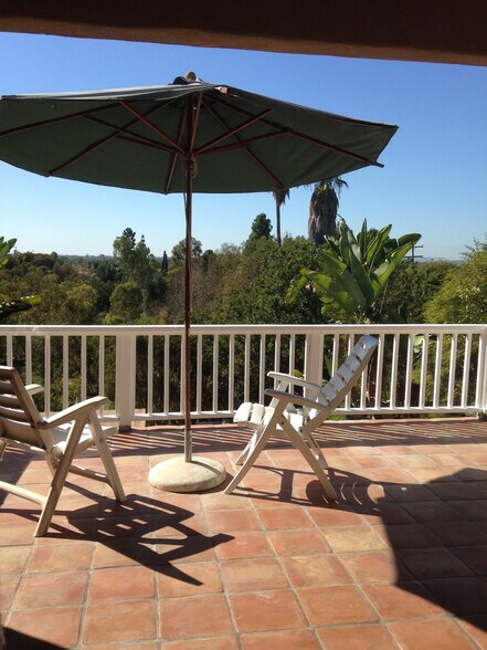 The deck - view to the backyard and canyon beyond - 4770 55th St