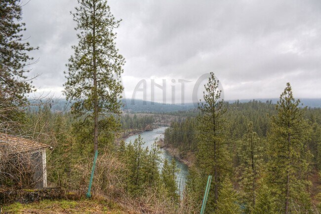 Building Photo - **COMING SOON** Beautiful Down River Brick Bungalow with River Views