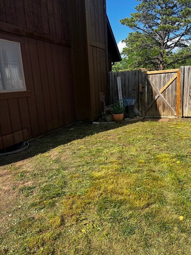 Fenced backyard. - 5341 SW 15th Ct